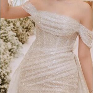 Wedding dress brand new  custom make,I have 3 dresses but use two